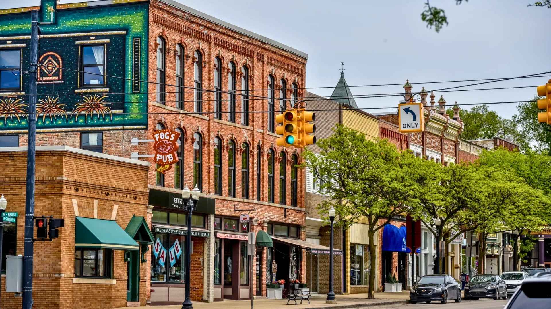 street view of a strip of local business's on the street
